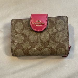Authentic Coach wallet.